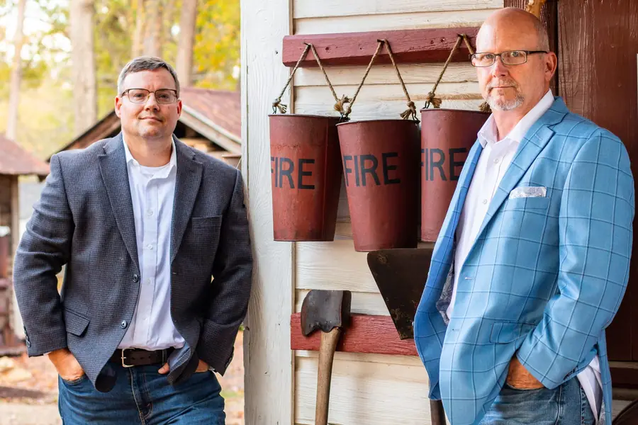 Kelly Childers and Scott Harris outside a historic firehouse